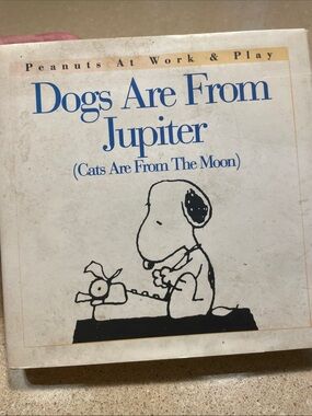 Peanuts Dogs Are From Jupiter Hardcover — White, Black, Blue